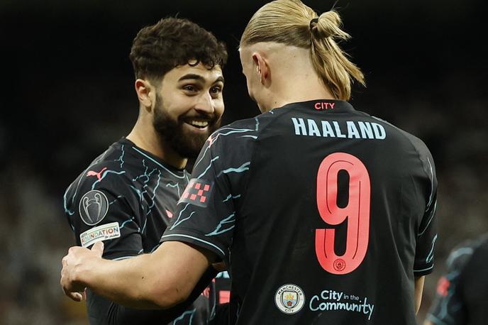 Joško Gvardiol | Real Madrid in Manchester City sta se razšla brez zmagovalca. Hrvat Joško Gvardiol, najdražji branilec na svetu, je sredi drugega polčasa popeljal evropske prvake v vodstvo s 3:2, a so gostitelji kaj kmalu postavili končni rezultat 3:3. | Foto Reuters