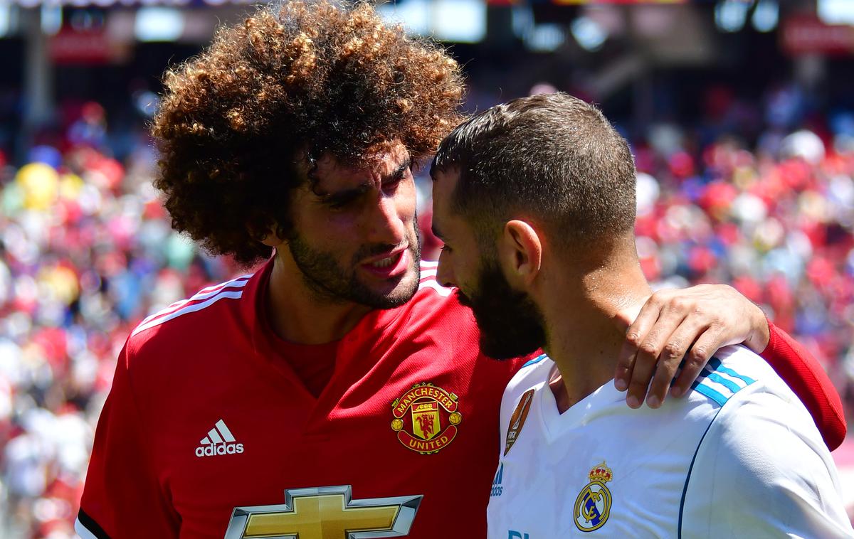 Marouane Fellaini | Marouane Fellaini je belgijskemu prvoligašu Standardu iz Liegea, kjer je začel svojo športno pot, posodil tri milijone evrov kot pomoč za preživetje kluba. | Foto Reuters