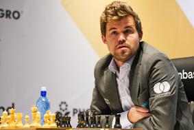 Magnus Carlsen ubranil naslov svetovnega prvaka