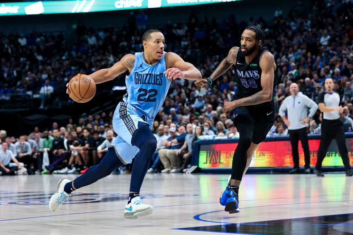 Memphis Grizzlies guard Desmond Bane (22) Dallas Mavericks forward Derrick Jones Jr. (55) | Desmond Bane (22) in Derrick Jones Jr. (55) v akciji.  | Foto Reuters