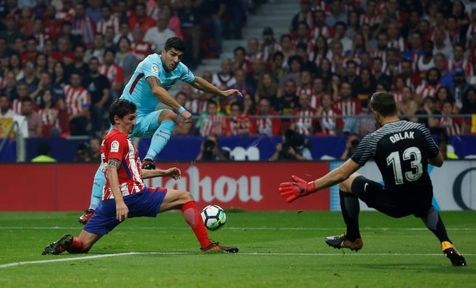 Jan Oblak se je na derbiju z Barcelono izkazal z nekaj izjemnimi obrambami. | Foto: Reuters