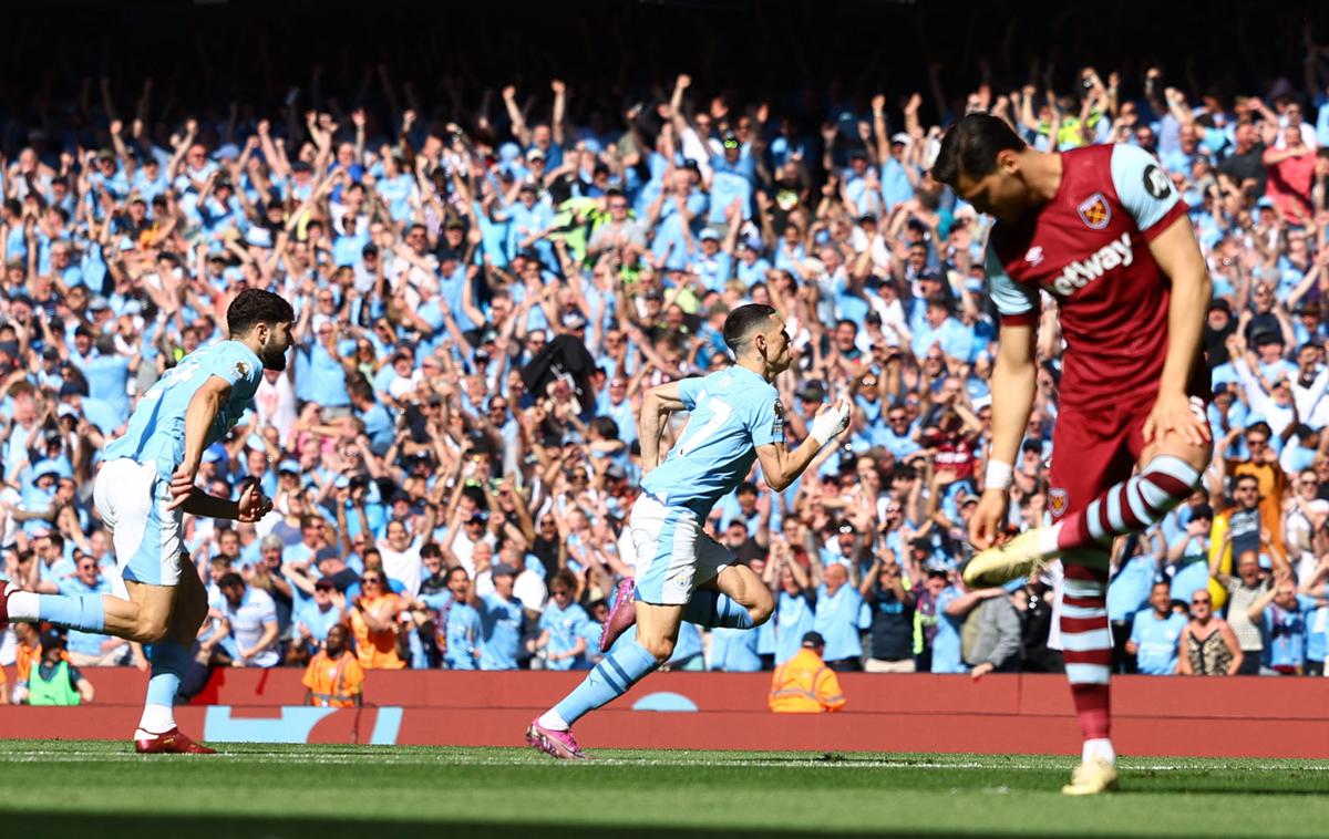 Phil Foden | Branilce naslova je Phil Foden, najboljši igralec prvenstva, popeljal v vodstvo proti West Hamu že v 2. minuti. V 18. minuti je povišal rezultat na 2:0, na koncu pa so gostitelji zmagali s 3:1. | Foto Reuters