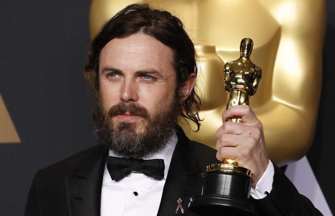 Casey Affleck je osvojil oskarja za glavno moško vlogo v filmu Manchester by the Sea. | Foto: Reuters