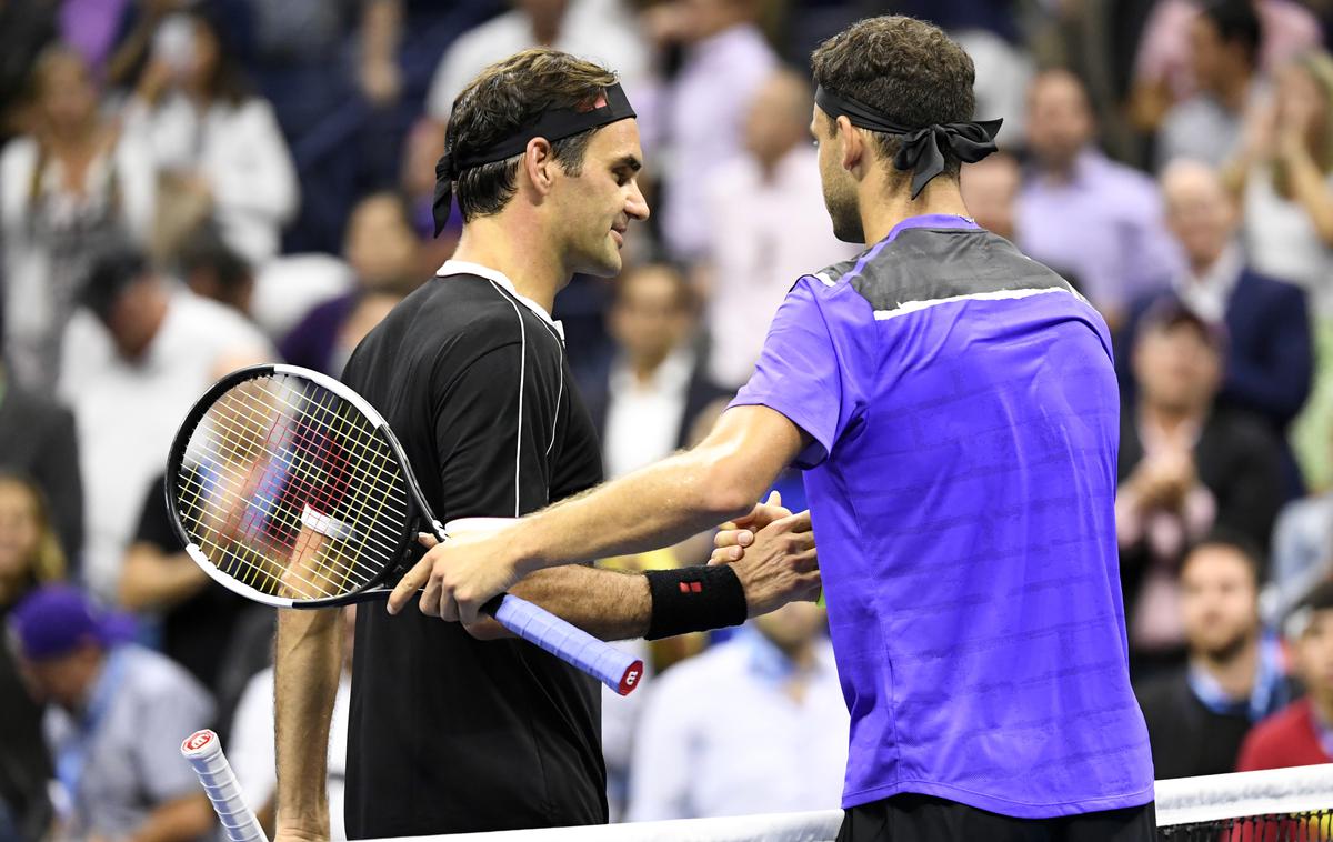 Riger Federer Grigor Dimitrov | Grigor Dimitrov je po velikem preobratu izločil Rogerja Federerja in se prvič v karieri prebil med najboljše štiri v New Yorku. | Foto Reuters