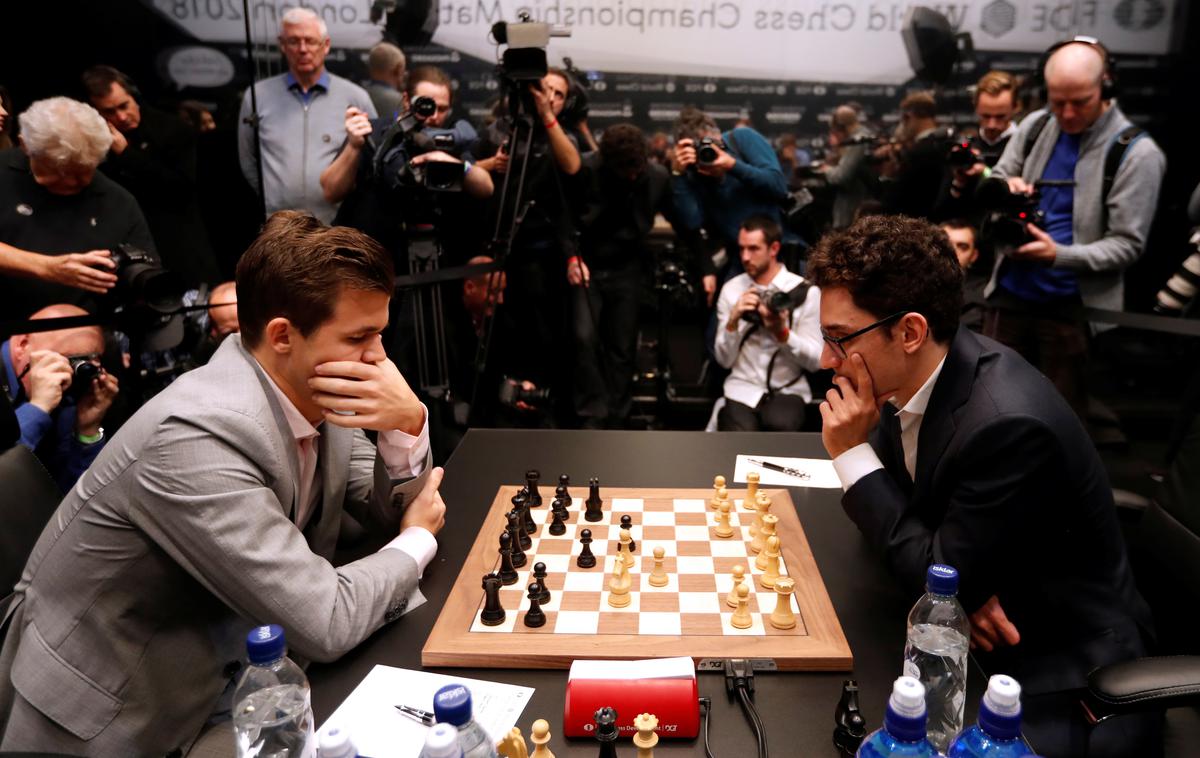 Magnus Carlsen, Fabiano Caruana | Magnus Carlsen in Fabiano Caruana še naprej ne popuščata. | Foto Reuters