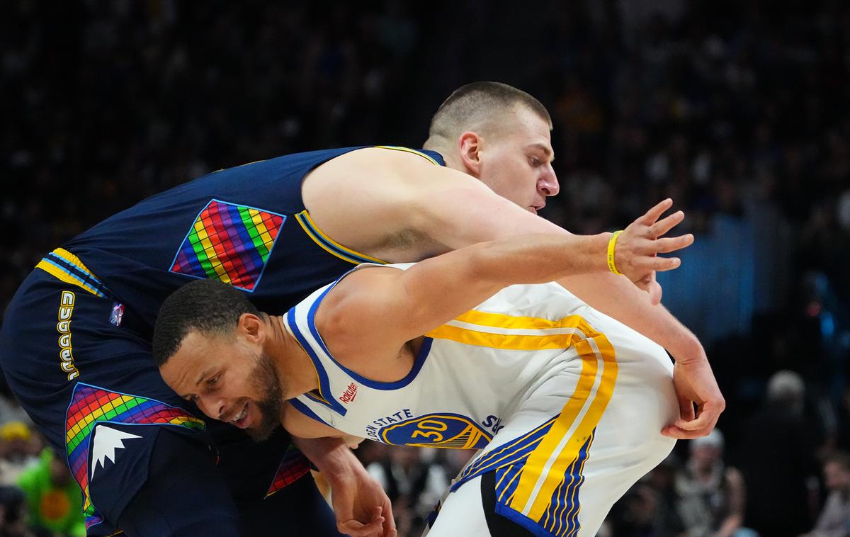 Jokić Curry | Nikola Jokić in Stephen Curry sta bila najboljša strelca svojih ekip. | Foto Reuters