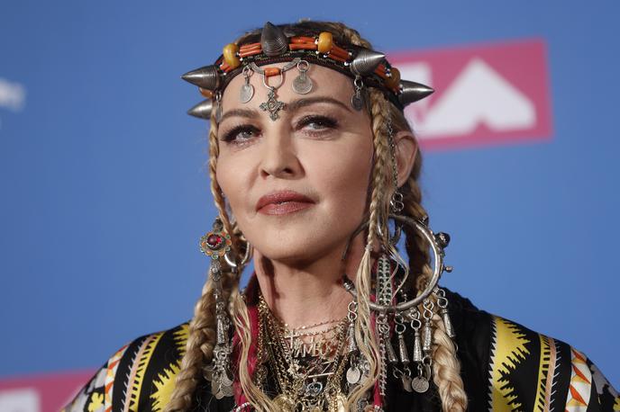 Madonna | Madonna je s svojim sebičnim poklonom Arethi Franklin razočarala marsikaterega televizijskega gledalca. | Foto Reuters