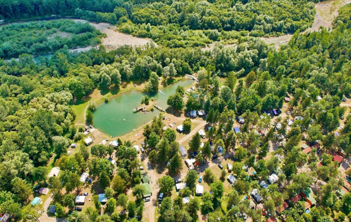 Kamp Menina | Kamp Menina je bil eden od kampov, ki je lansko poletje v ujmah utrpel najhujše posledice, saj ga je Savinja poplavila v celoti, škodo po ujmi pa so ocenili na okoli tri milijone evrov. | Foto Kamp Menina