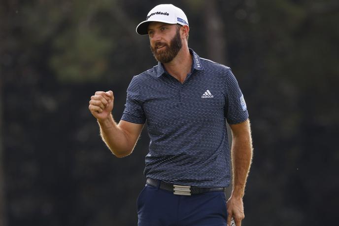 Dustin Johnson | Američan Dustin Johnson je prvič oblekel zeleni suknjič. | Foto Reuters