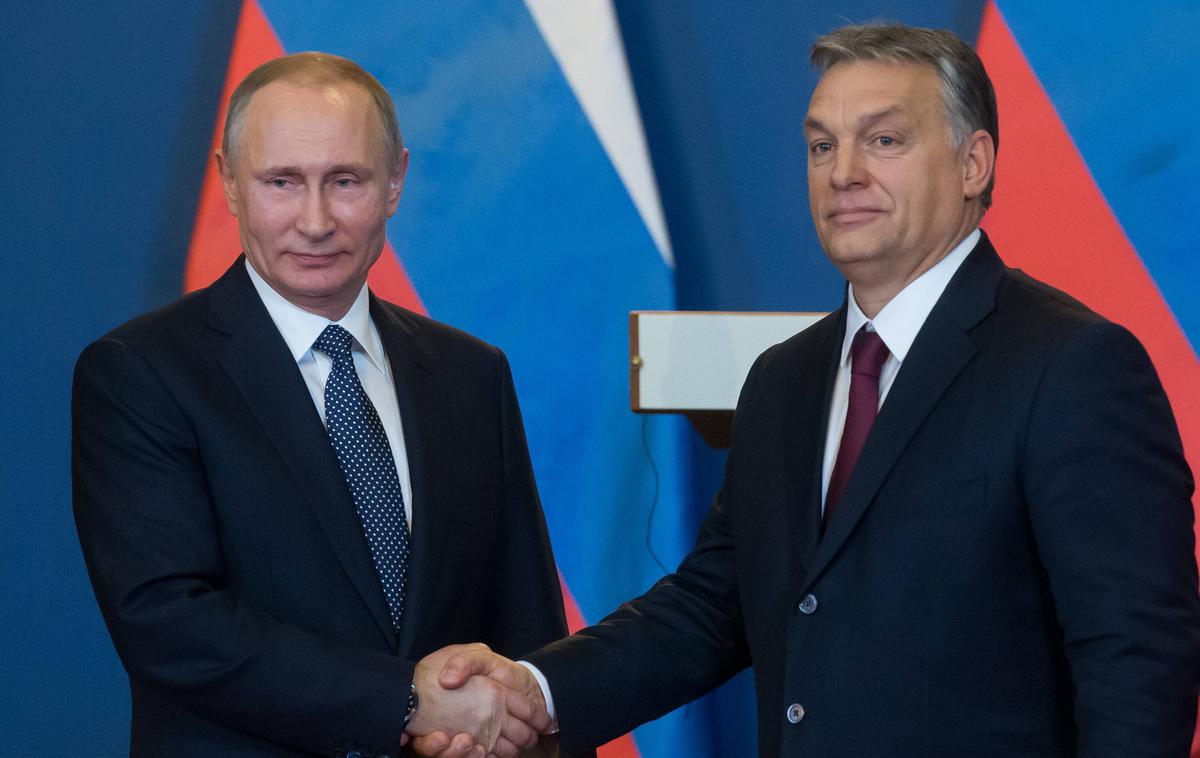 Vladimir Putin in Viktor Orban | "Pripadniki Orbanovega režima nimajo nobene težave s Putinovimi zločini," je dejal Márton Gyöngyösi, evropski poslanec Madžarske iz stranke Jobbik. | Foto Guliverimage