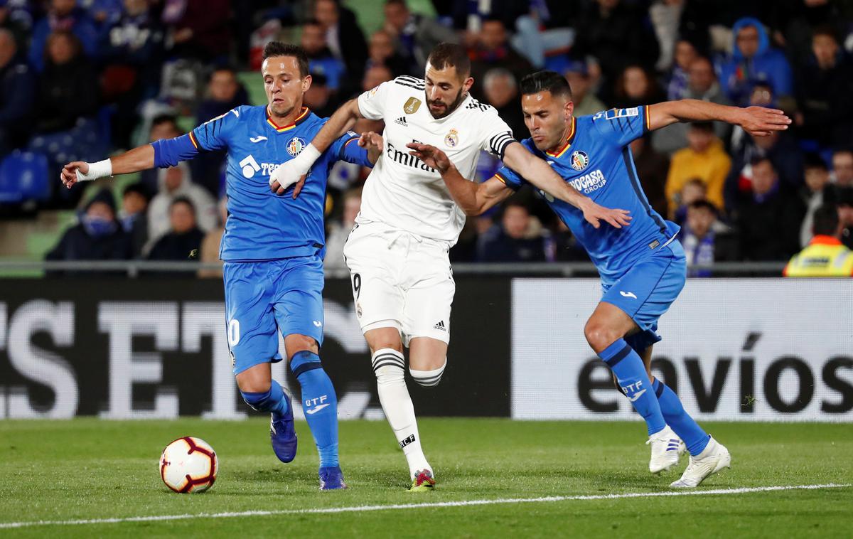 Real Madrid Getafe | Getafe je ustavil v zadnjem času najbolj nevarnega galaktika, Karima Benzemaja. | Foto Reuters