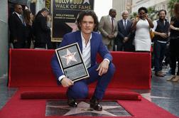 Orlando Bloom s sinom in svojo zvezdo