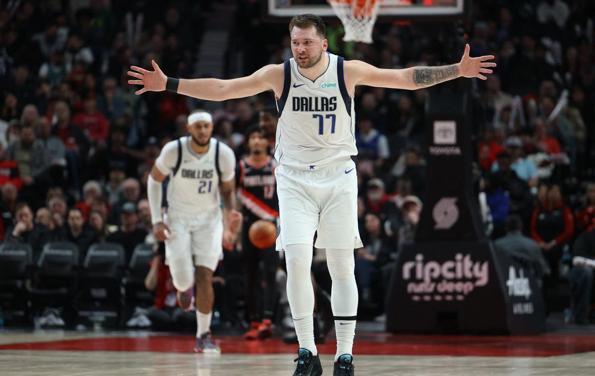 Luka Dončić | Luka Dončić se je vrnil na parket in prispeval pomemben delež k zmagi oslabljenega Dallasa na gostovanju v Portlandu. | Foto Reuters