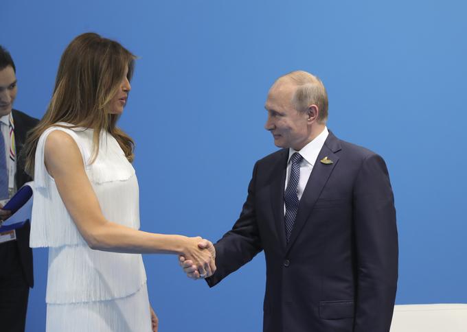 V Hamburgu so na večerji skupaj posedli Putina in Melanio Trump. | Foto: Reuters