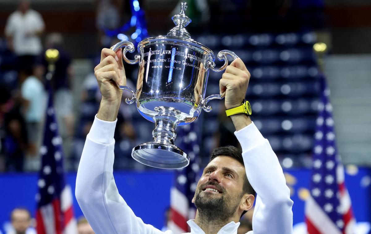 Novak Đoković finale OP ZDA | Novak Đoković je v nedeljo četrtič osvojil grand slam v New Yorku. | Foto Reuters