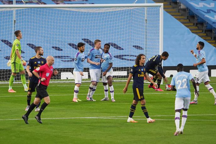 manchester City Arsenal | Manchester City je na prvem obračunu po koronapremoru s 3:0 premagal Arsenal. | Foto Reuters