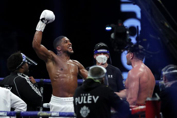 Anthony Joshua, Kubrat Pulev | Anthony Joshua je obdržal naslove WBA, WBO in IBG v težki kategoriji. | Foto Reuters