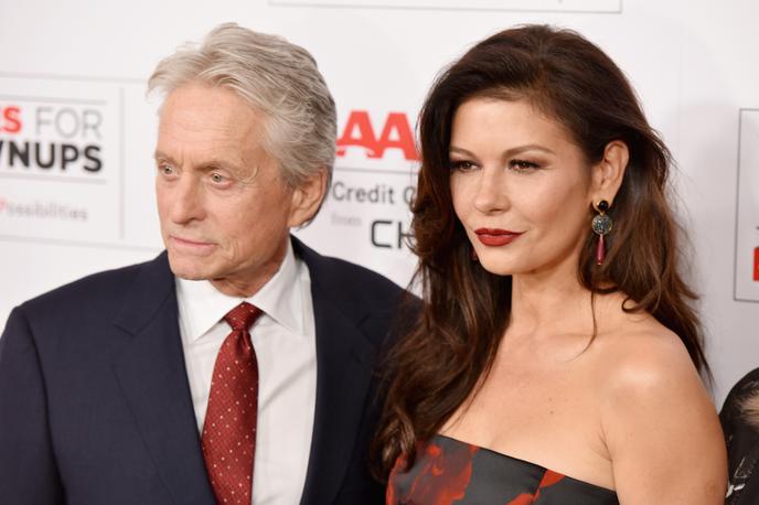 Michael Douglas, Catherine Zeta-Jones | Catherine verjame svojemu možu, da so obtožbe lažne. | Foto Getty Images