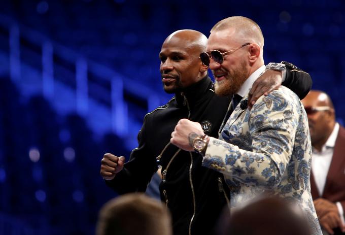 Irski magnet za denar se je v času svojega pavziranja od UFC v boksarskem dvoboju udaril s Floydom Mayweatherjem. Gladko je izgubil, a tudi zaslužil 100 milijonov ameriških dolarjev. | Foto: Reuters