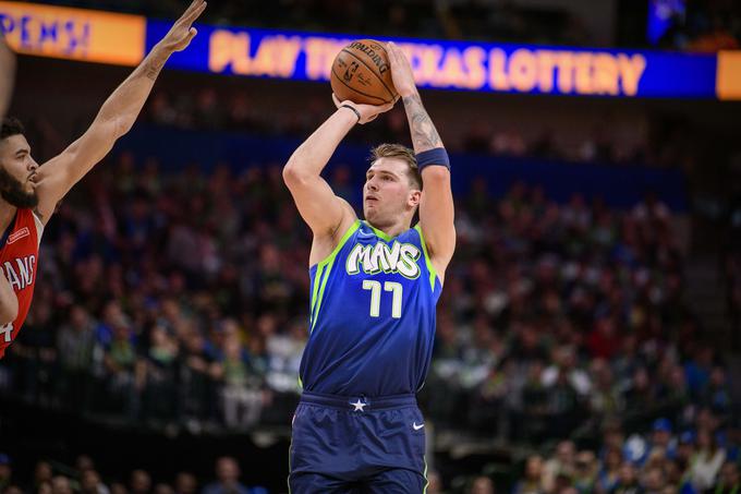 Dončić je s povprečjem 30,1 točke na tekmo tretji najboljši strelec lige NBA v tej sezoni. | Foto: Reuters