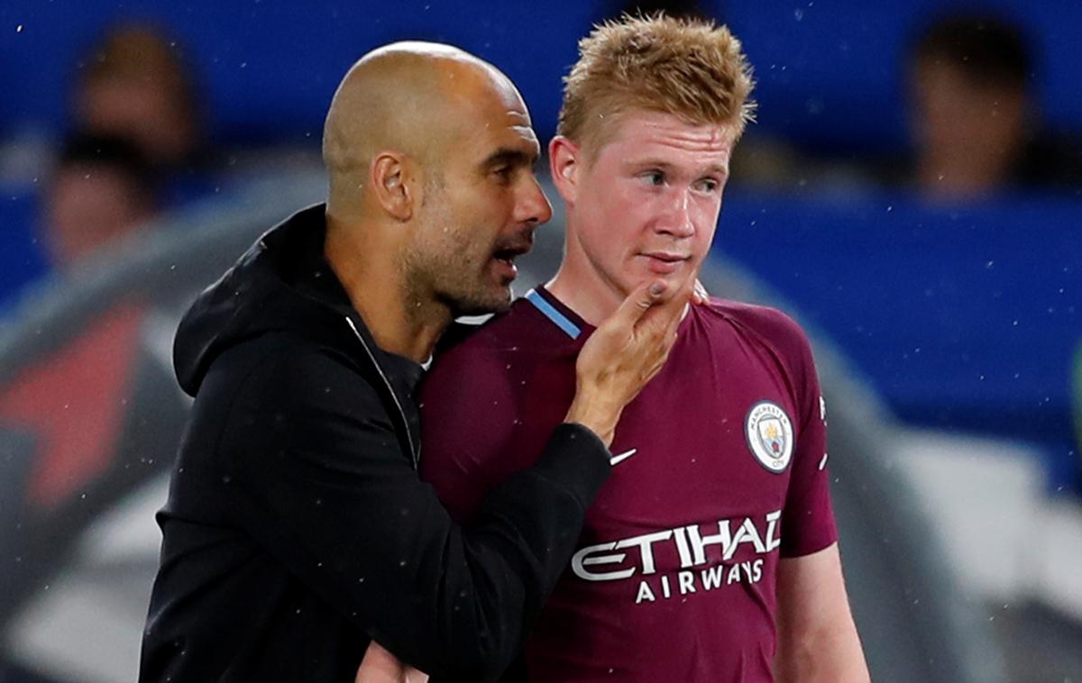 Jose Guardiola Kevin De Bruyne | Kevin de Bruyne je kandidat za Uefinega nogometaša leta, njegov trener pri Manchester Cityju Pep Guardiola pa je kandidat za Uefinega trenerja leta. | Foto Reuters